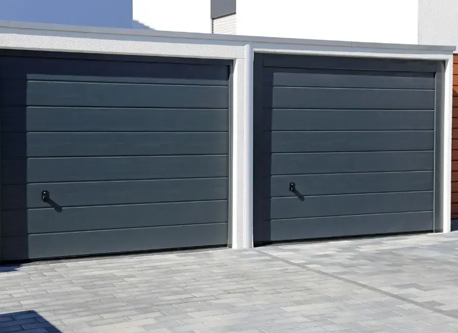 Charcoal flush-panel garage doors