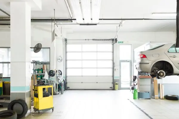 Commercial glass garage door in a service bay